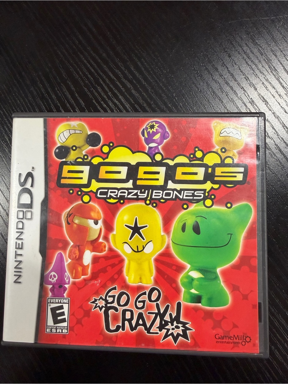 Nintendo DS Red Game Cover with Yellow and Green Characters